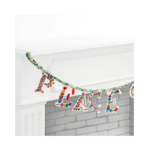 IMAGE OF Felted Wool Peace on Earth Garland ON FIREPLACE RECOMMENDED BY DWELLING ENVY