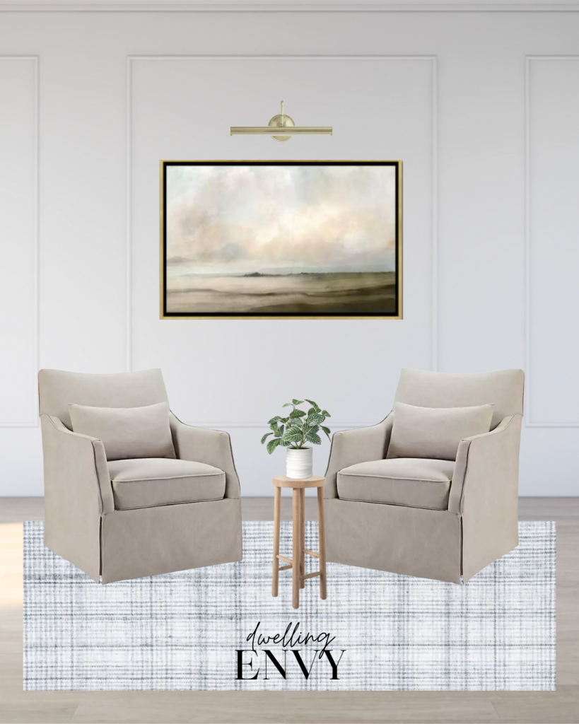 shoppable design board living room sitting area with white walls with molding and light oak floors tan skirted accent chairs with soft plaid accent rug and oversized tranquil landscape artwork