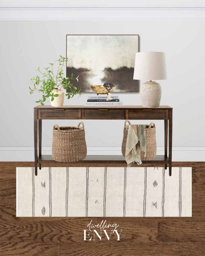 shoppable design board entryway hallway modern organic abstract landscape artwork medium toned console table lamp and greenery with decorative basket